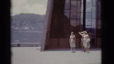 Clarkdale Arizona-1966: Women Gathered Outside Stone Building Observing Arid Landscape