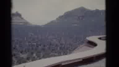 Clarkdale Arizona (1966): Sagebrush In Front Of Small Pointed Buttes In A Desert
