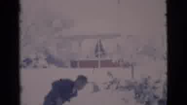 Clarkdale Arizona (1966): Man Shoveling Snow Camera Pans Right To Reveal Lamppost