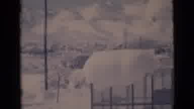 Clarkdale Arizona (1966): A Snow Covered Scene With Hills And Power Lines And A