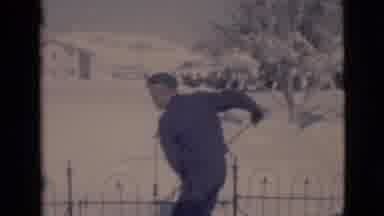 Clarkdale Arizona (1966): Boy Shovelling Snow And Throwing It Towards The Camera