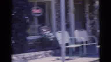 Clarkdale Arizona-1966: Two Boys Outside A Stone Building On A Sunny Day