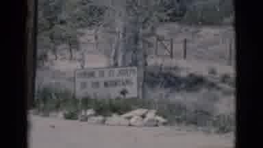 Clarkdale Arizona (1966): Entrance Sign In The Middle Of The Road Leading To A