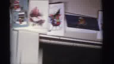 Tuscon Arizona (1966): A Wall Of Christmas Photos Hanging On The Wall In A Room
