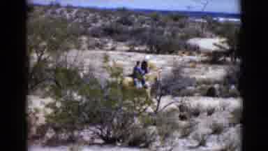 Clarksdale Arizona (1968): Three People All On Horseback Riding Through A Desert