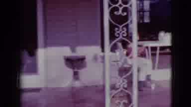 Clarksdale Arizona (1968): Kids Sit At White Outdoor Table On Front Porch Of House