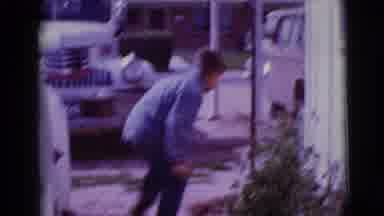 Clarksdale Arizona (1968): Child Finding Something Near A House