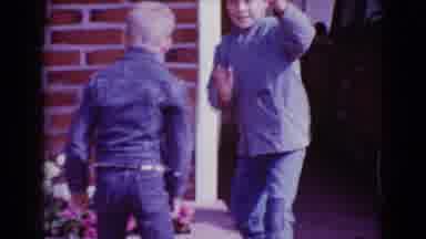 Clarksdale Arizona (1968): Two Boys Outside A House Looking Through Flower Beds