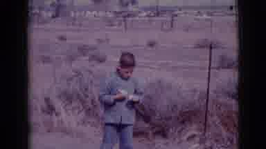 Clarksdale Arizona (1968): Young Boy Playing With Toys And Point At Himself And