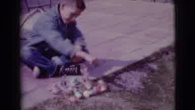 Clarksdale Arizona (1968): A Boy Playing With His Toys Outside