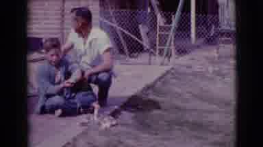 Clarksdale Arizona (1968): Father With His Two Sons Playing With Toys Footage