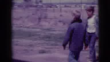 Clarksdale Arizona (1968): Two Boys Playing A Dive Game Outside With Man
