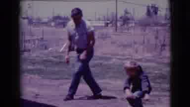 Clarksdale Arizona (1968): Son And Father Play Marbles Together