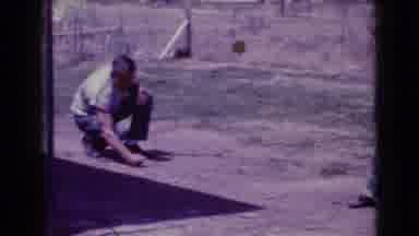 Clarksdale Arizona (1968): Dad And Young Boy Flipping A Coin Then Dad Working On