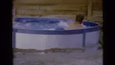 Clarksdale Arizona (1968): Two Young Boys Playing And Swimming In A Small Above