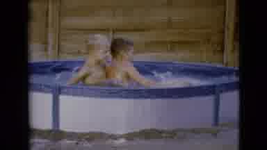Clarksdale Arizona (1968): Two Boys Play And Wrestle In A Small Above-Ground Pool