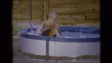 Clarksdale Arizona (1968): Two Little Boys Playing In A Small Pool In The Backyard