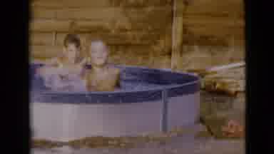 Clarksdale Arizona (1968): Two Kids Having Fun In A Pool In Their Backyard