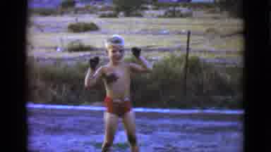 Clarksdale Arizona (1968): Little Boy In Swimsuit With Mud On Hands Pointing