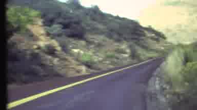 Grand Canyon Arizona (1972): Vehicle Driving Down A Road Through A Dry Canyon With