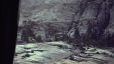 Grand Canyon Arizona (1972): The Rough Face Of A Mountain Is Seen Through The