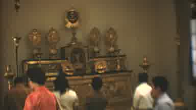 Mexico City (1973): Inside A Church Building With People Inside Near The Front