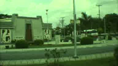 Yucatan Mexico (1973): Woman Walking In Front Of Building Followed By Another
