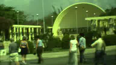 Yucatan Mexico (1973): Small Crowd Walks Towards Dome Exhibit On A Sunny Day