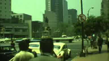 Yucatan Mexico (1973): Traffic Cars People Town Square Statue Past Metropolitan