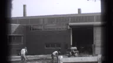 Cleveland Ohio USA (1939): Workers In A Group Are Working Together To Build