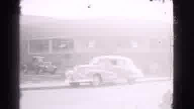 Cleveland Ohio USA (1939): Camera Pans Across The Building And Captures The Cars