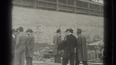 Cleveland Ohio USA (1939): Man Spitting In Front Of Dressed Men Congregating