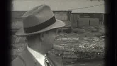 Cleveland Ohio USA (1939): Smiling Businessman With Hat Looking At Buildings