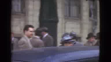 Cleveland Ohio USA (1939): Well Dressed Men Hurry In Building