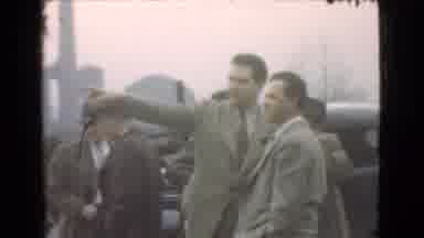Cleveland Ohio USA (1939): A Pointing Man At A Public Place With Other Men And