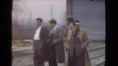 Cleveland Ohio USA (1939): Footage Shows Five Men In Long Tan Coats Standing