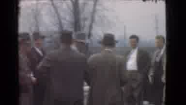 Cleveland Ohio USA (1939): Several Men In Similar Suits And Hats Stand Around And