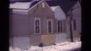 Cleveland Ohio USA (1939): Old Choppy Film Panning Across A Brown Home On The Snow