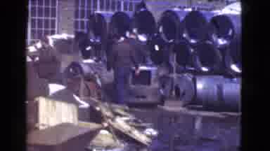 Cleveland Ohio USA (1939): Man Riding A Forklift Truck On A Dirty And Wet Floor