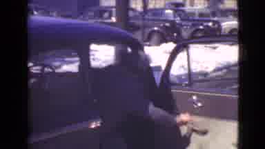 Cleveland Ohio USA (1939): Two Women Walking In A Parking Lot Wearing Coats