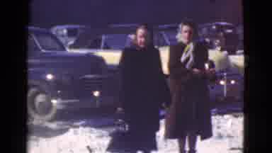 Cleveland Ohio USA (1939): Two Women Walk Across Street On A Sunny Winter Day