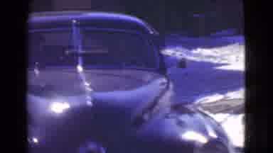 Cleveland Ohio USA (1939): View Of A Man Walking As Car A Drives Down A Street