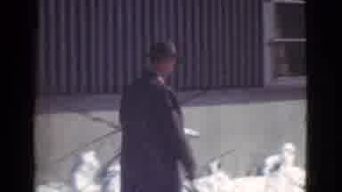 Cleveland Ohio USA (1939): Man In Trenchcoat Walks Briskly Scowling In Very Cold