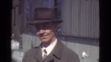 Cleveland Ohio USA (1939): A Man In A Brown Suit And Brown Hat Smiling To The