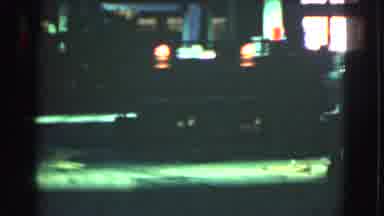 Cleveland Ohio USA (1939): Large Red And White Truck Drives At Night Near What