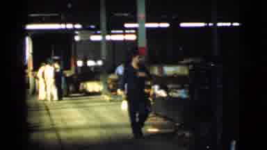 Cleveland Ohio USA (1939): A Worker In Uniform Walks Down The Causeway Of An