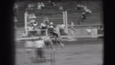 Denver Colorado USA (1941): A Cowboy Rides A Horse At A Rodeo In Black And White