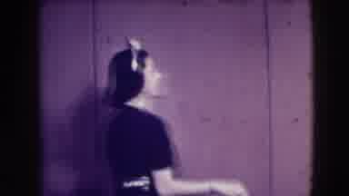 Joliet Illinois USA (1941): Woman Walking Then Doing A Turn As She Smiles Modeling