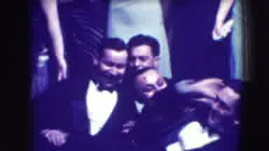Joliet Illinois USA (1941): Men In Tuxedos And Women In Dresses Dancing And Acting