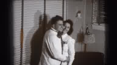 Joliet Illinois USA (1941): A Man And Woman Laugh And Hold Each Other As They Pose